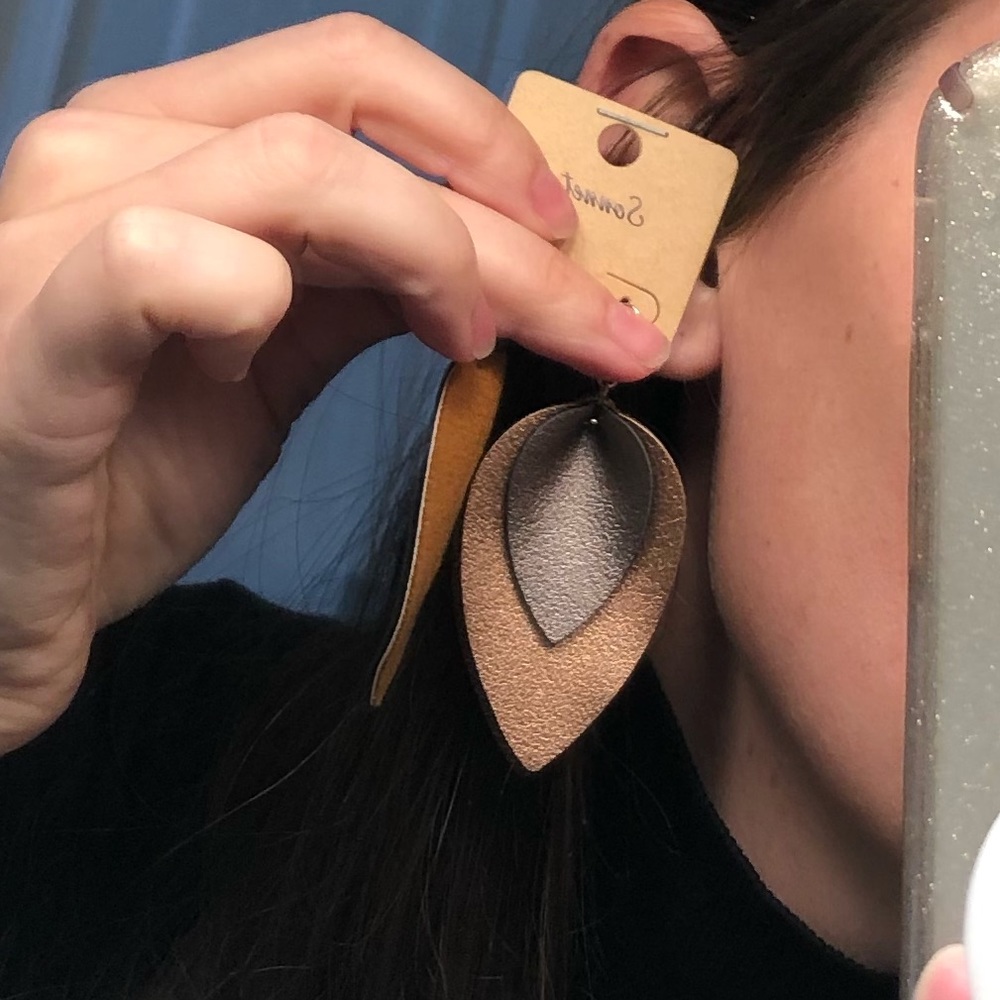 Never worn leather earrings